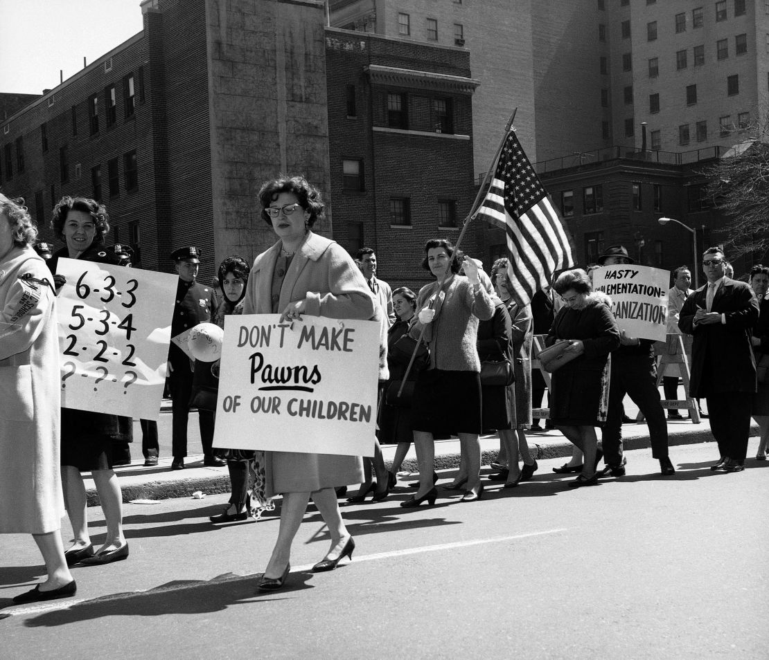 Protests over integrating schools is not new. In 1965 members of a parents' association picketed outside the Board of Education in Brooklyn, New York, against a proposal to integrate public schools.