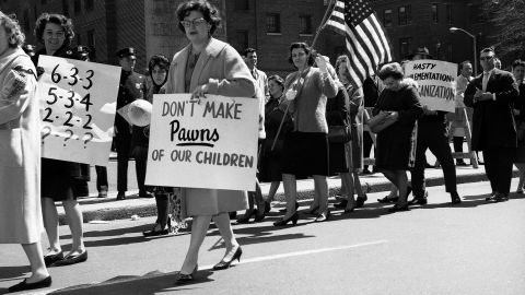 Protests over integrating schools is not new. In 1965 members of a parents' association picketed outside the Board of Education in Brooklyn, New York, against a proposal to integrate public schools.