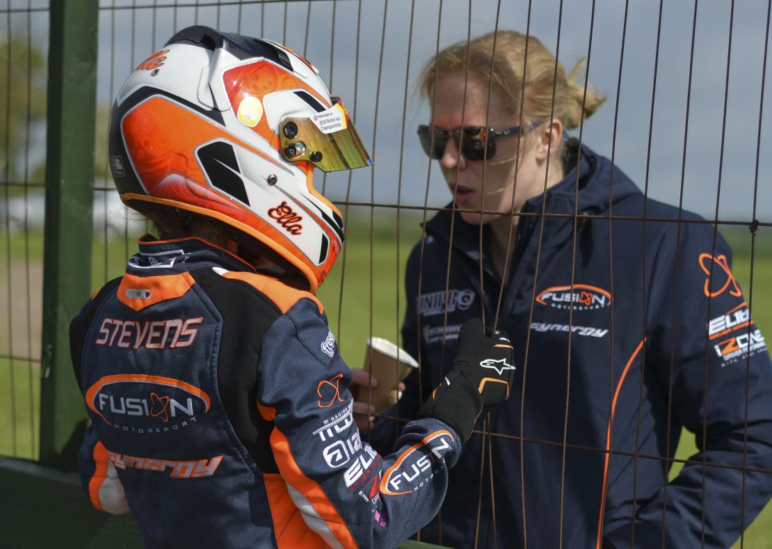 Ella Stevens, left, with race car driver Alice Powell.