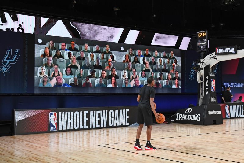 The NBA will use artificial intelligence and a tap-to-cheer app feature to help fans stuck at home get in the game CNN