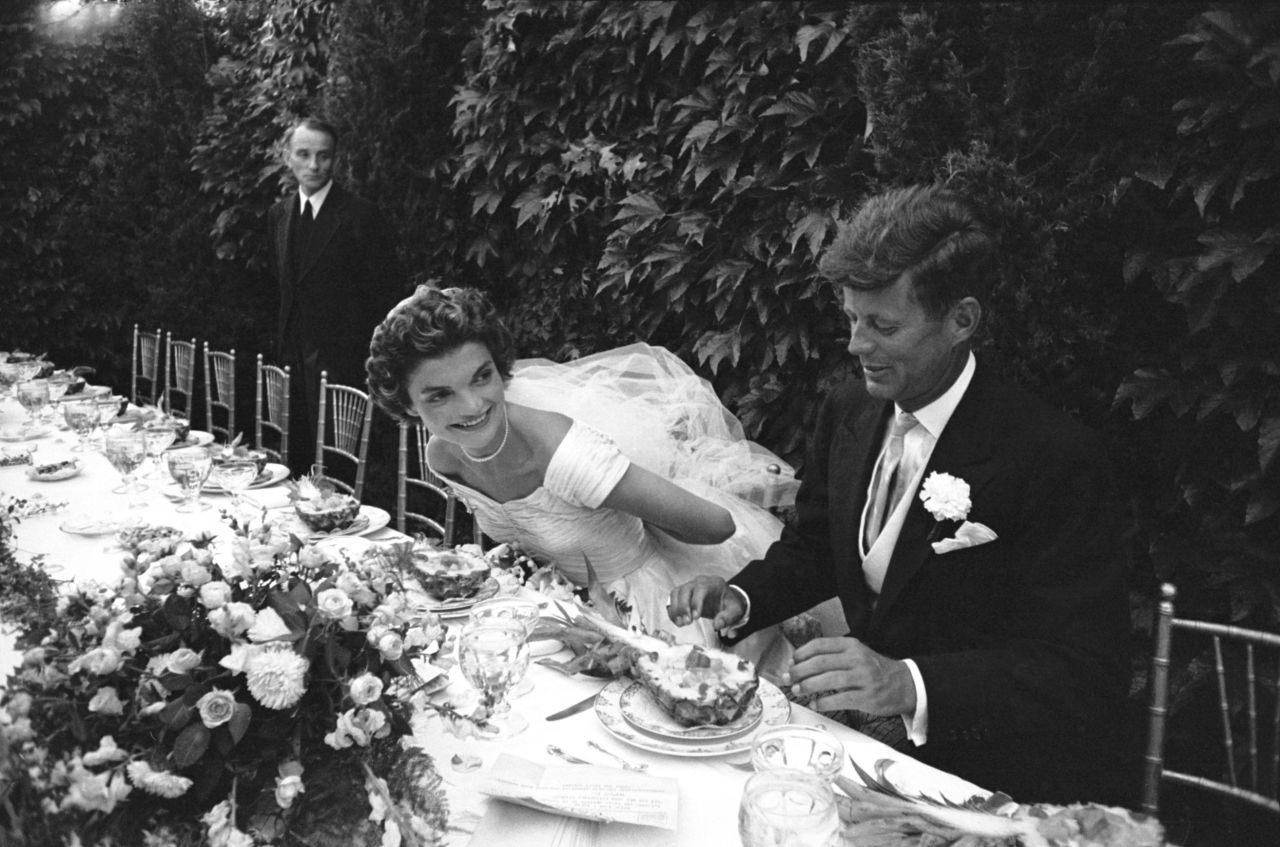 Jackie and John Kennedy are shown in their wedding attire.