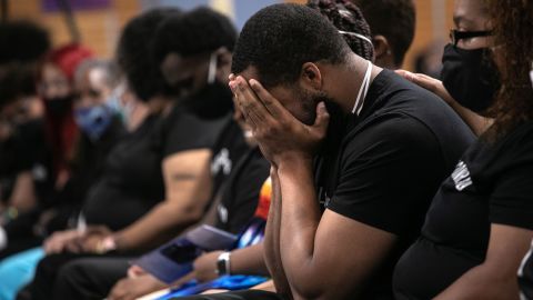 Family members mourn the death of Conrad Coleman Jr. following his funeral service on July 3, 2020, in New Rochelle, New York. Coleman, 39, died of Covid-19 on June 20, 2020, just over two months after his father Conrad Coleman Sr. also died of the disease. The African American community has been especially hard hit by the coronavirus pandemic.