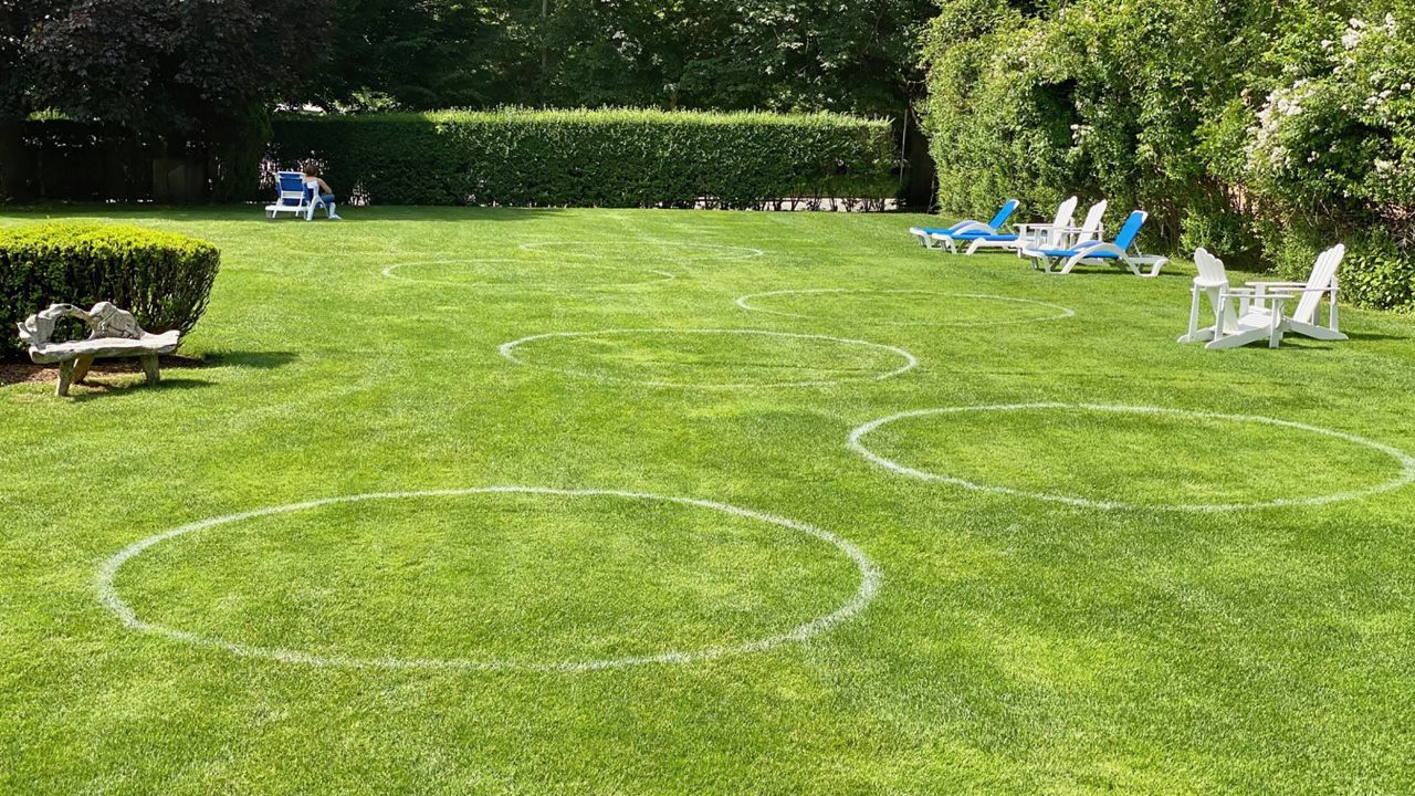 Keeping social distancing front of mind on the grounds of the Southampton Inn.