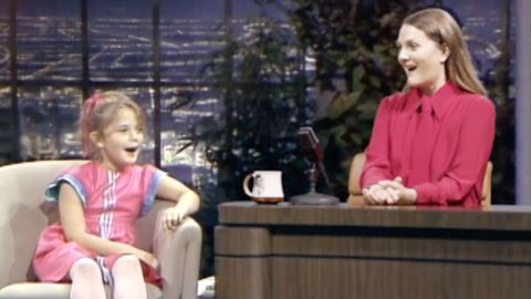 Drew Barrymore interviews her younger self as part of a promo for the Drew Barrymore Show