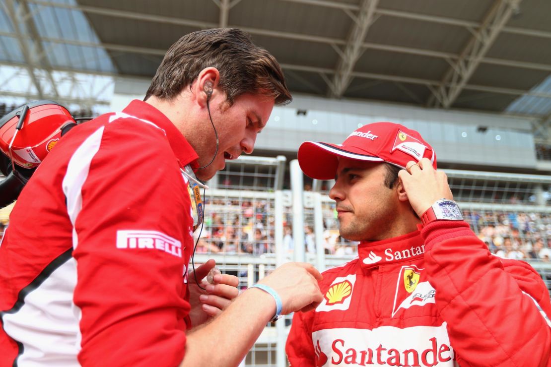 Felipe Massa of Brazil and Ferrari talks with his race engineer Rob Smedley before the start of the Korean Formula One Grand Prix at the Korea International Circuit on October 14, 2012 in Yeongam-gun, South Korea.