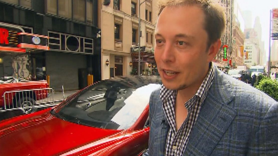 Elon Musk in front of the Nasdaq stock exchange on the day of Tesla's IPO.