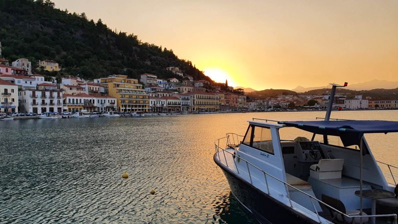 <strong>Gythio at sunset:</strong> The quiet port town of Gythio is a great place to overnight during a Peloponnese road trip. Its waterfront restaurants offer a low-key place to unwind after a day of sightseeing or swimming.