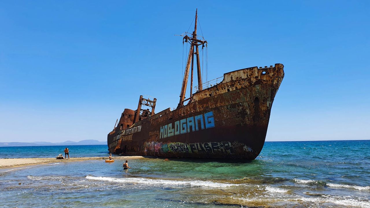 <strong>Unusual attraction:</strong> This "ghost ship" stranded on Valtaki beach north of Gythio makes an Instagram-friendly backdrop to a swimming session. The shipwreck of the Dimitrios has been there since slipping its moorings in 1981.