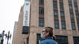 A pedestrian wearing a protective mask walks past Twitter headquarters in San Francisco, California, U.S., on Thursday, July 16, 2020. As Twitter Inc. grapples with the worst security breach in its 14-year history, it must now uncover whether its employees were victims of sophisticated phishing schemes or if they deliberately allowed hackers to access high-profile accounts. Photographer: David Paul Morris/Bloomberg via Getty Images