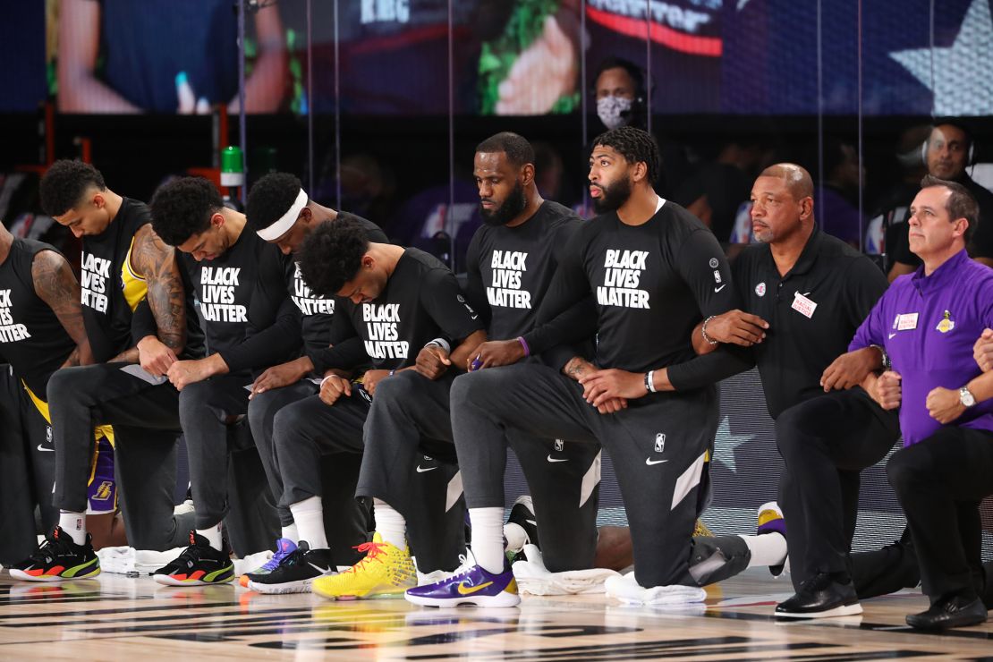 Los Angeles Lakers players kneeled during the national anthem before the game against the LA Clippers.