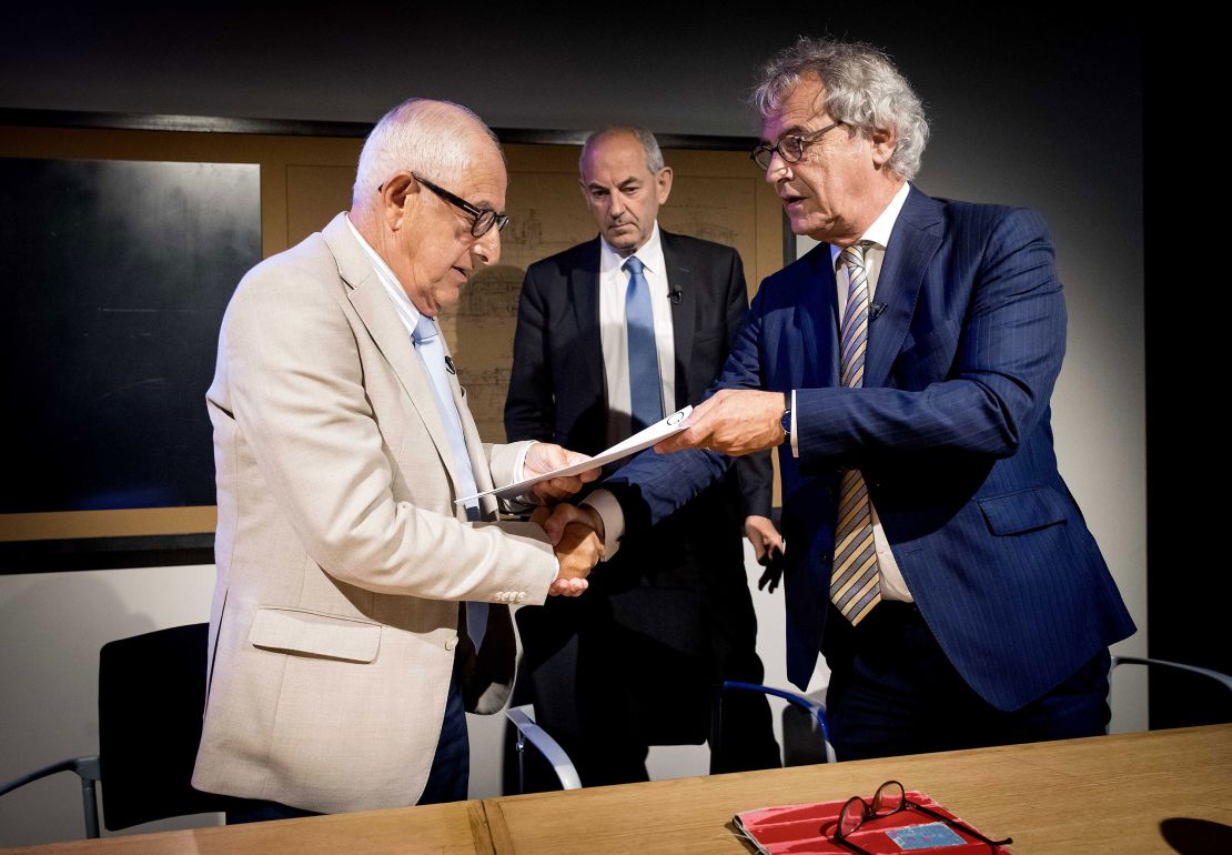 Holocaust victim Salo Muller (L) and president director of Dutch railway company Nederlandse Spoorwegen Roger van Boxtel (R) during a presentation in Utrecht, Netherlands, on June 26, 2019. 