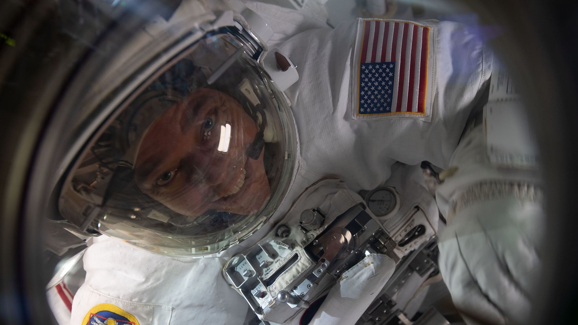 Behnken is pictured inside the Quest airlock at the end of a July 1 spacewalk to replace batteries on the International Space Station's Starboard-6 truss structure.