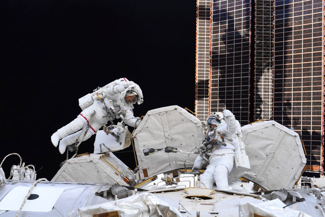 Astronaut Doug Hurley captured this image of fellow astronauts Bob Behnken and Chris Cassidy during their spacewalk on July 21, 2020.
