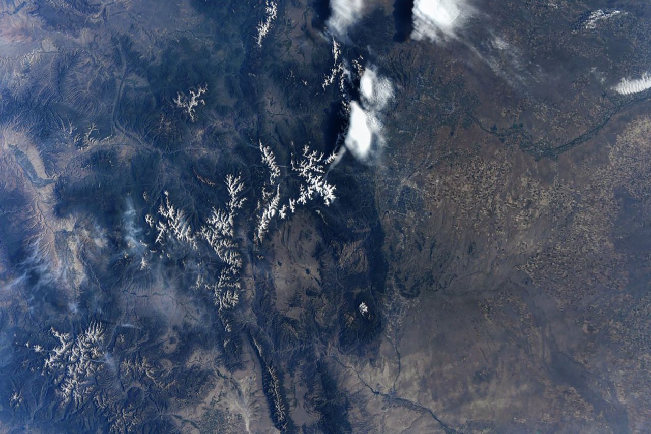 The Rocky Mountains and Denver as seen by Hurley on July 26.
