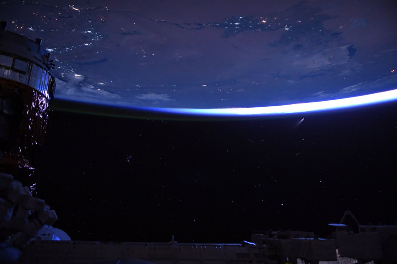 "Night sky, just before dawn from @Space_Station. Stars, cities, spaceships, and a comet!" Behnken wrote on July 9.