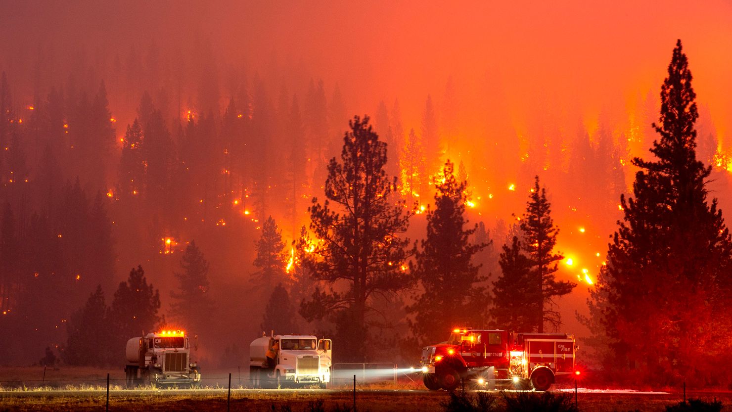 Firefighters mop up hot spots near Susanville, California, July 20, 2020.