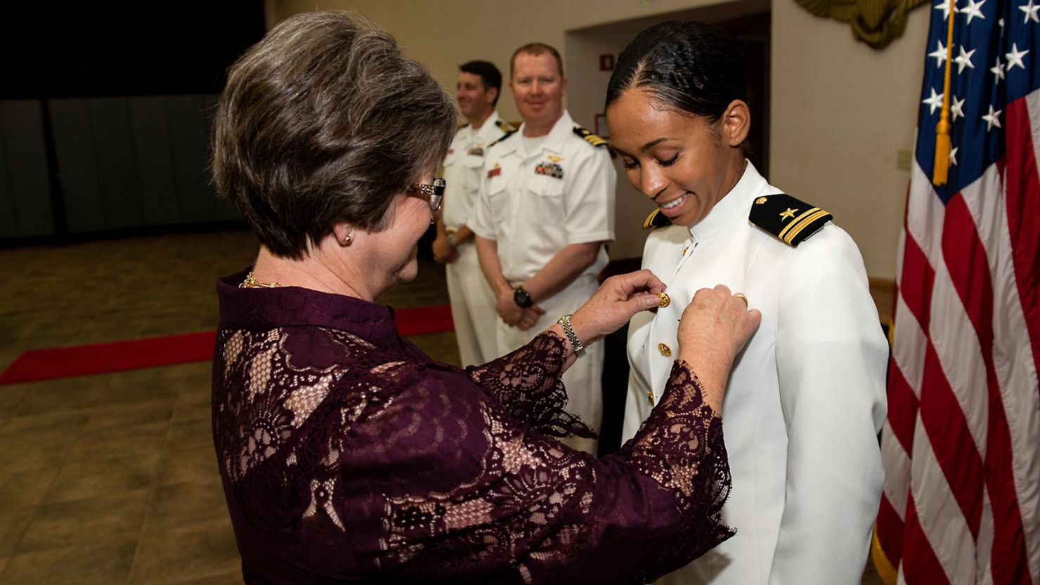 US Navy's first Black female tactical jet pilot gets her 'wings of gold