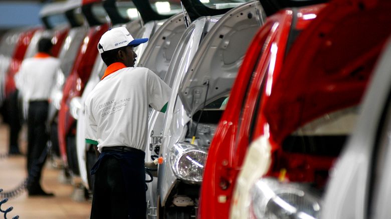 Workers assemble cars at Hyundai's plant in Sriperumbudur, about 45 km (28 miles) north of Chennai February 2, 2008.