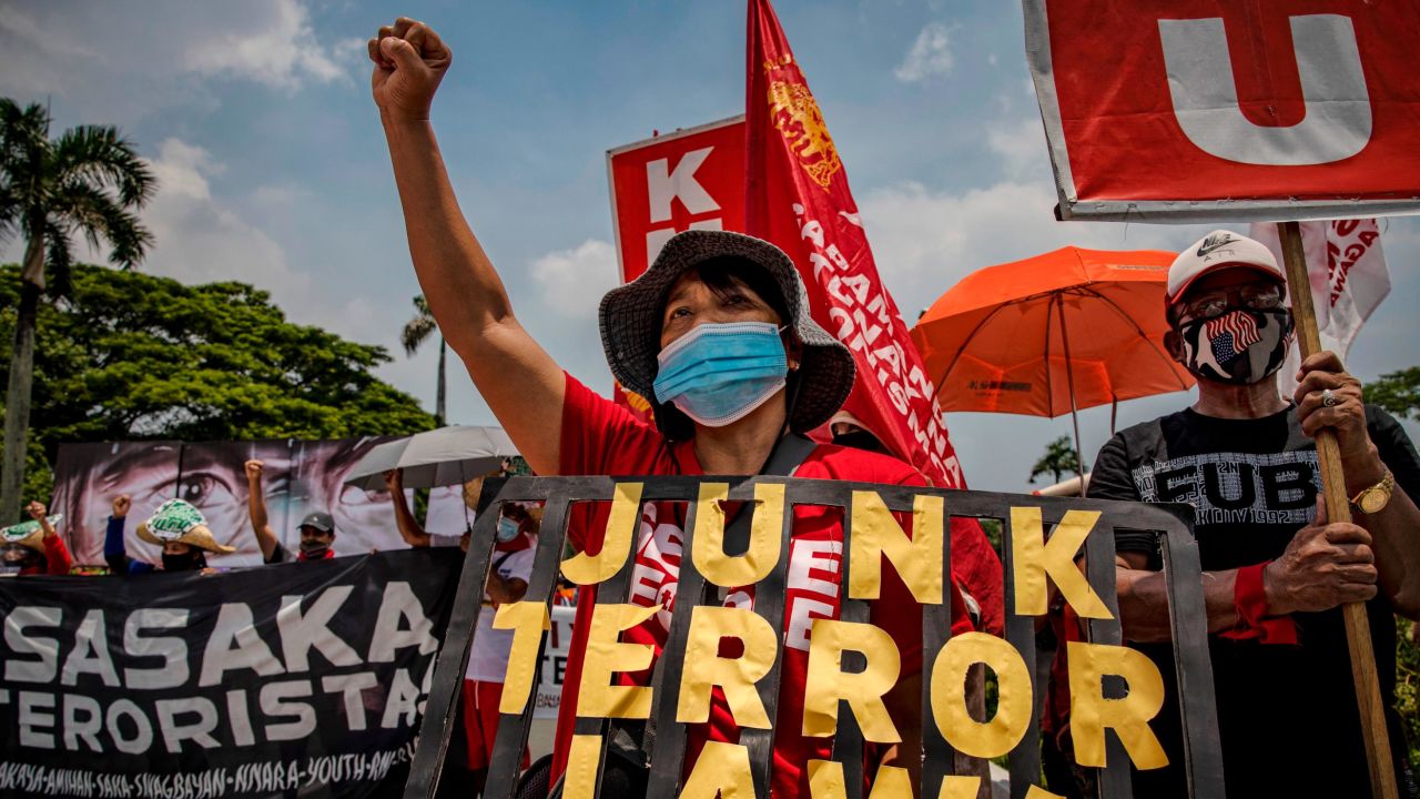 Protesters wearing facemasks take part in a protest against President Duterte on July 27 in Quezon city, Metro Manila, Philippines.