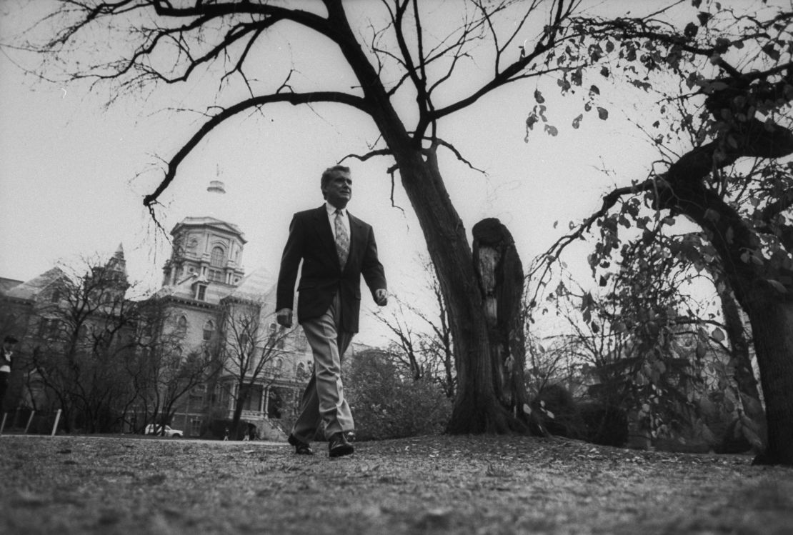 Regis Philbin walks across the University of Notre Dame campus in 1993.