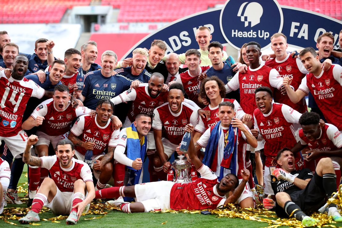 Arsenal players celebrate winning the FA Cup final.