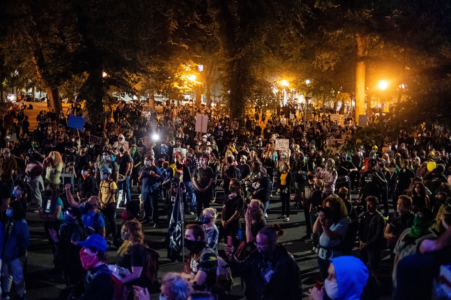 Protesters gather at the Justice Center and federal courthouse on July 31.