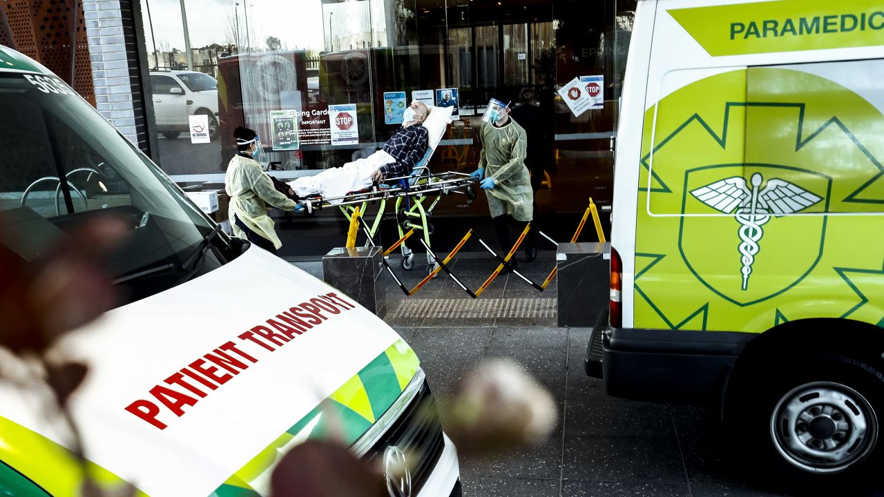 A resident of a care facility is taken to hospital on Tuesday as coronavirus grips Victoria.