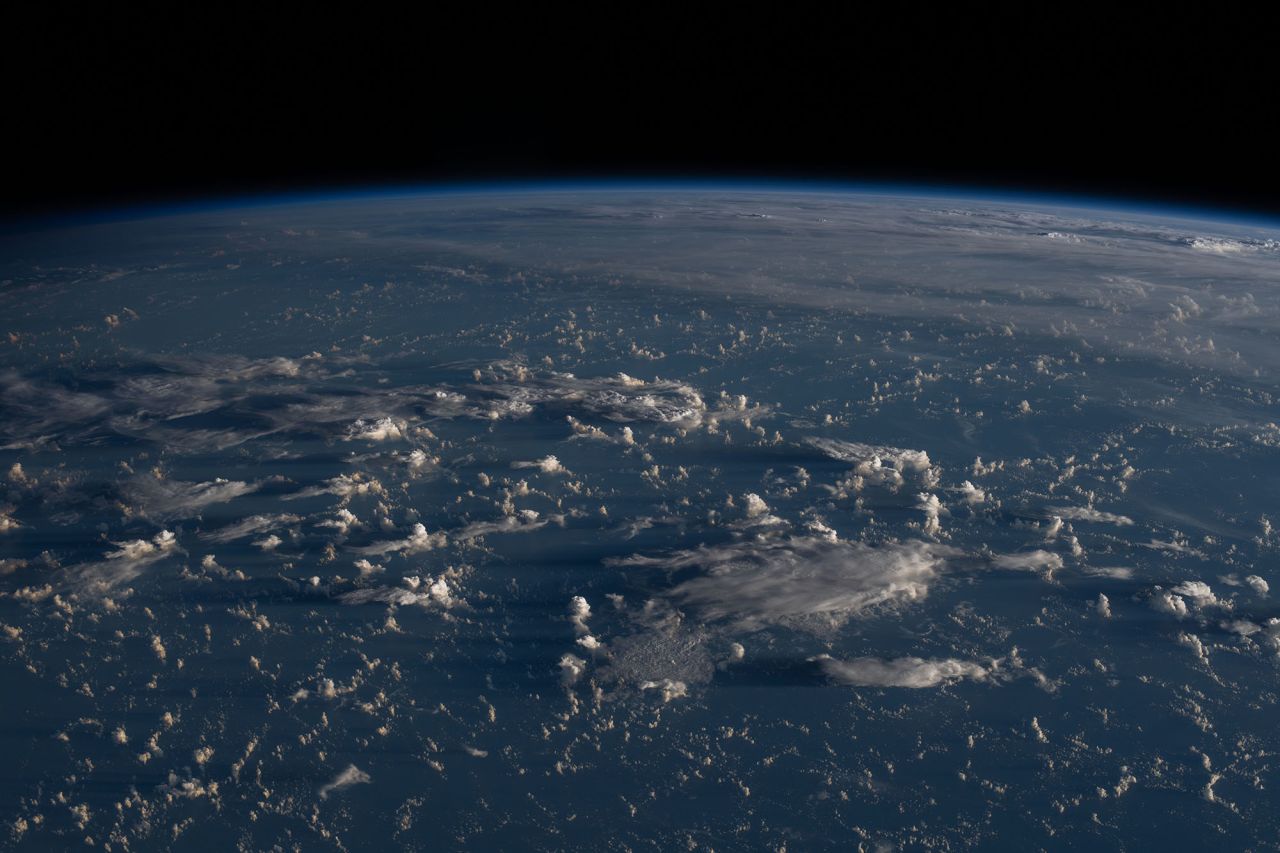 Sunrise casts long shadows from the clouds across the Philippine Sea as the International Space Station orbited about 200 miles east of Taiwan on July 13.