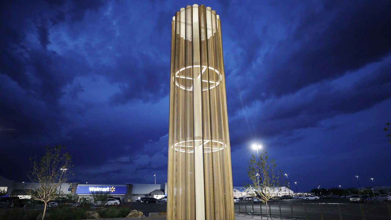 A memorial honors victims in the parking lot of a Walmart in El Paso, Texas, after an August 2019 shooting there. 