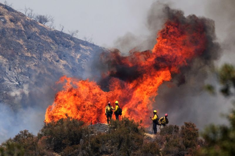 California s Apple Fire has grown to more than 20 000 acres and is