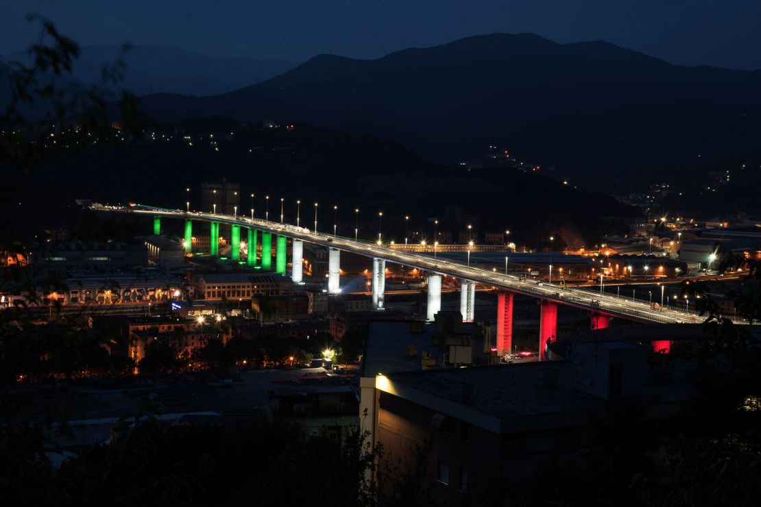 The bridge pictured here illuminated in the colors of the Italian flag.