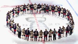 TORONTO, ONTARIO - JULY 30: The Boston Bruins and the Columbus Blue Jackets gather at center ice prior to their exhibition game before the 2020 NHL Stanley Cup Playoffs at Scotiabank Arena on July 30, 2020 in Toronto, Ontario, Canada.  (Photo by Andre Ringuette/Freestyle Photo/Getty Images)