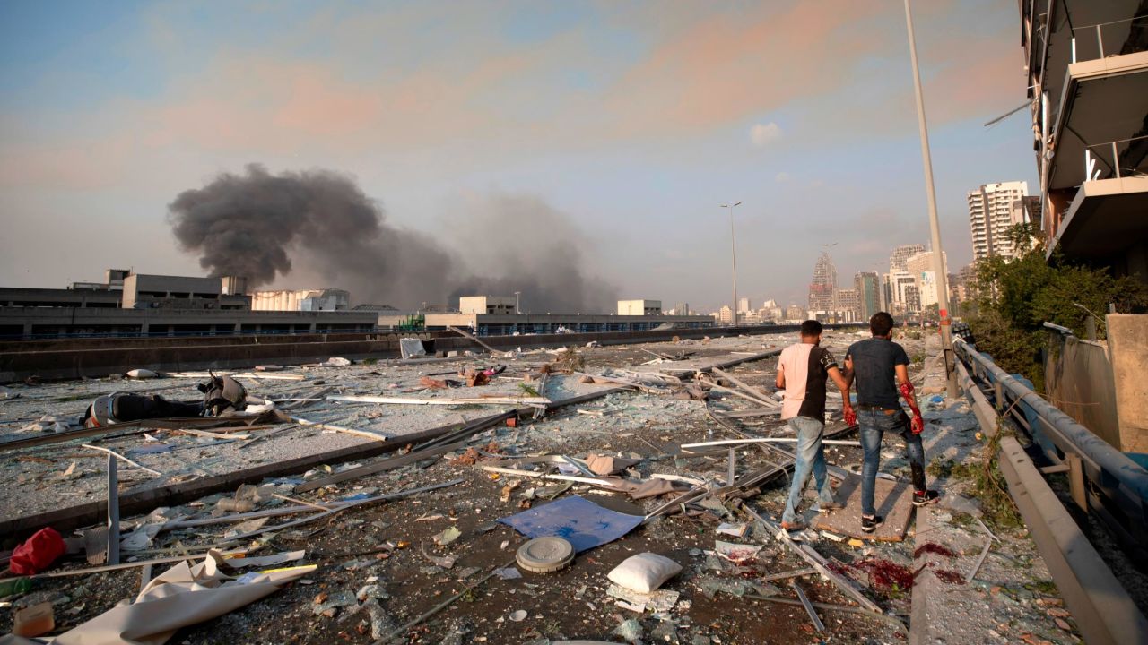 Aftermath of a massive explosion is seen in in Beirut, Lebanon, Tuesday, Aug. 4, 2020. Massive explosions rocked downtown Beirut on Tuesday, flattening much of the port, damaging buildings and blowing out windows and doors as a giant mushroom cloud rose above the capital. Witnesses saw many people injured by flying glass and debris. (AP Photo/Hassan Ammar)