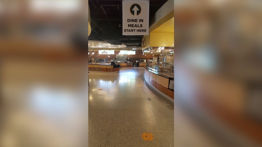 Arrows show students how to flow through the cafeteria at St. Norbert.