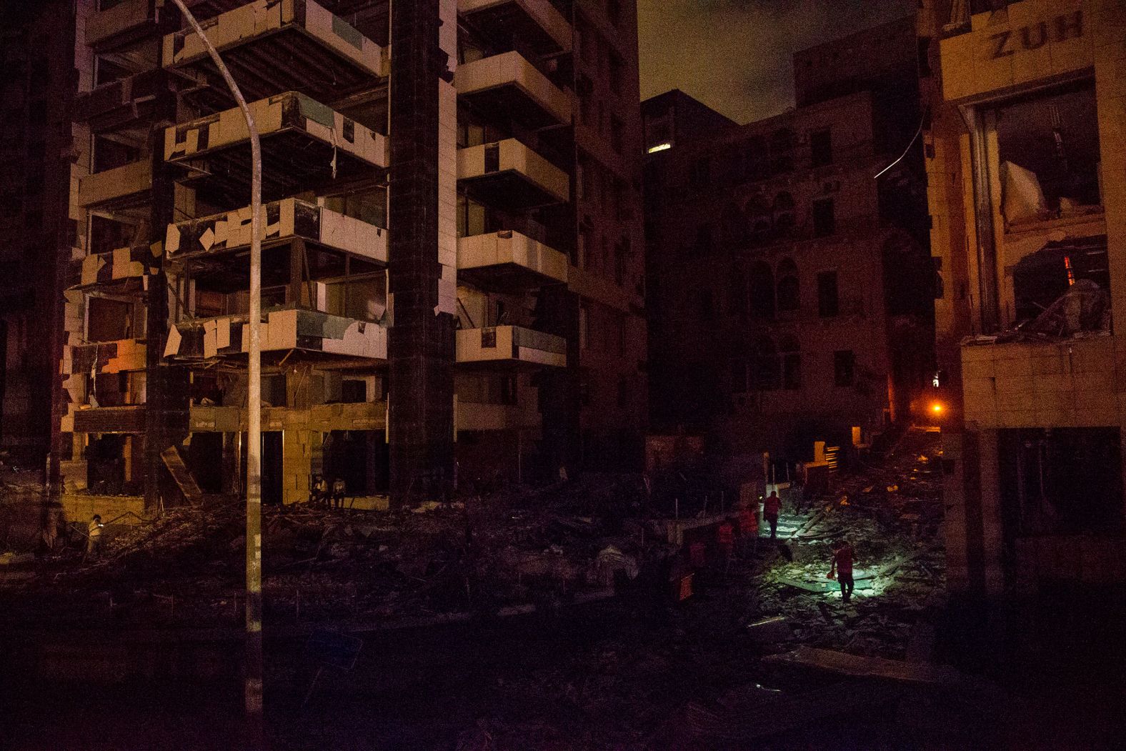 Rescue crews search a street for survivors on August 4, 2020. "People are asking the emergency department about their loved ones, and it is difficult to search at night because there is no electricity," Health Minister Hamad Hassan <a href="https://www.cnn.com/middleeast/live-news/lebanon-beirut-explosion-live-updates-dle-intl/h_191ad60f239ae9b49e4332022ce8db8c" target="_blank">told the Reuters news agency.</a> "We are facing a real catastrophe and need time to assess the extent of damages."