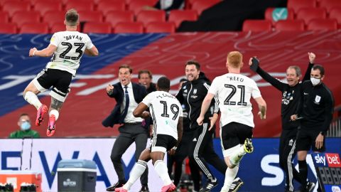 Joe Bryan celebrates after scoring Fulham's first goal.