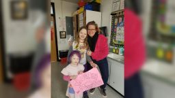 Teacher Sarah Backstrom, right, said home schooling her daughters Josephine, 10, and Vivienne, 4, was a challenge, so she understands why parents want their kids back in school.