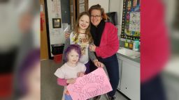Teacher Sarah Backstrom, right, said she doesn't want to home school her daughters Josephine ten, and Vivienne, four, t