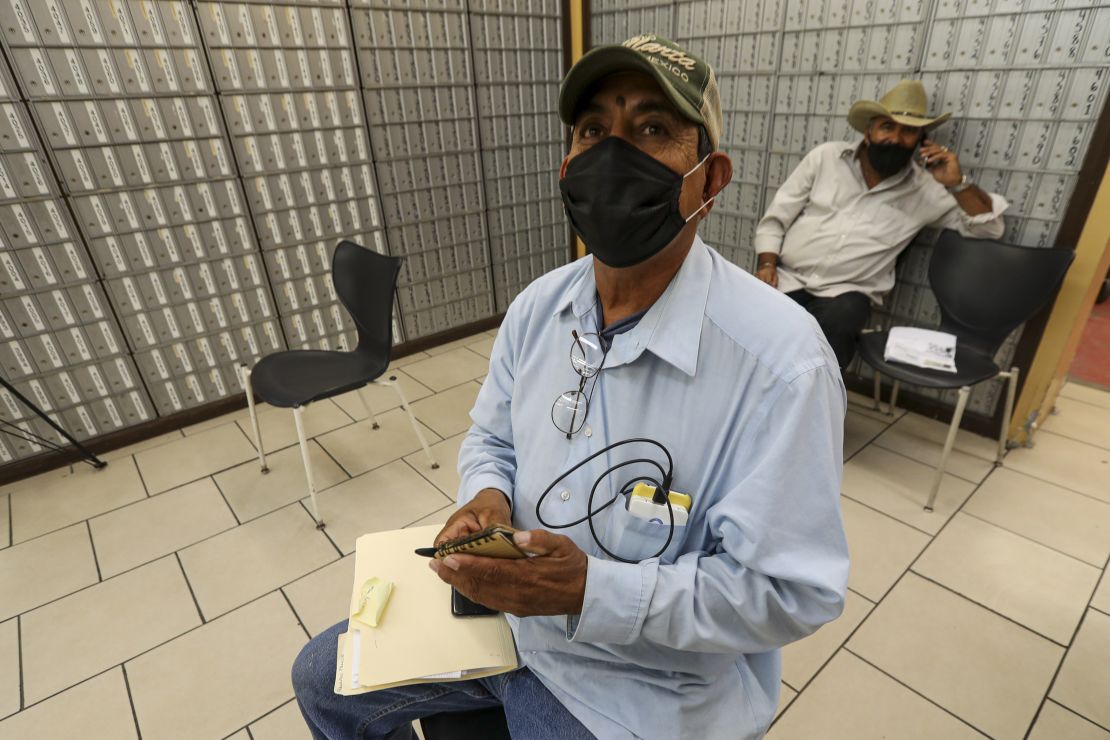 Fernando Fausto, 59, a resident Mexicali, appears at a private service agency to file for unemployment on July 1, 2020 in Calexico, Calif.