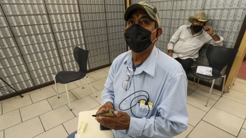 Fernando Fausto, 59, a resident Mexicali, appears at a private service agency to file for unemployment on July 1, 2020 in Calexico, Calif.