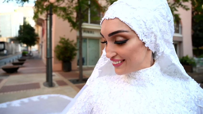 A bride poses in her wedding dress moments before the explosion in Beirut on August 4, 2020.