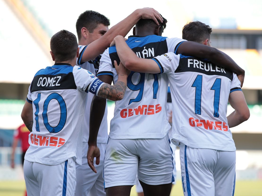 Zapata celebrates with his team-mates after scoring the opening goal against Hellas Verona.