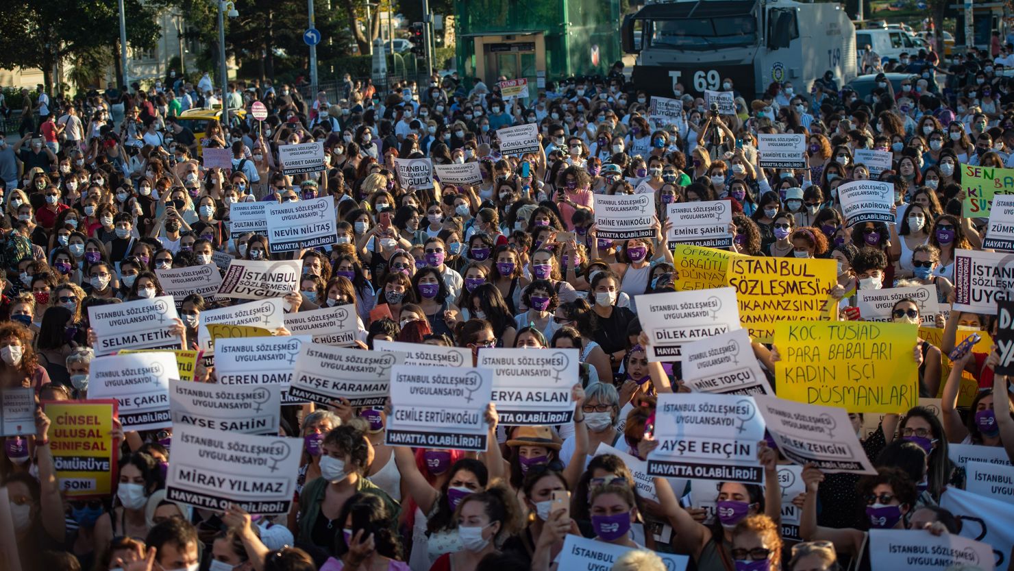 Demonstrators wearing protective face masks hold up placards with names of women during a demonstration for a better implementation of the Istanbul Convention in Istanbul on Wednesday.