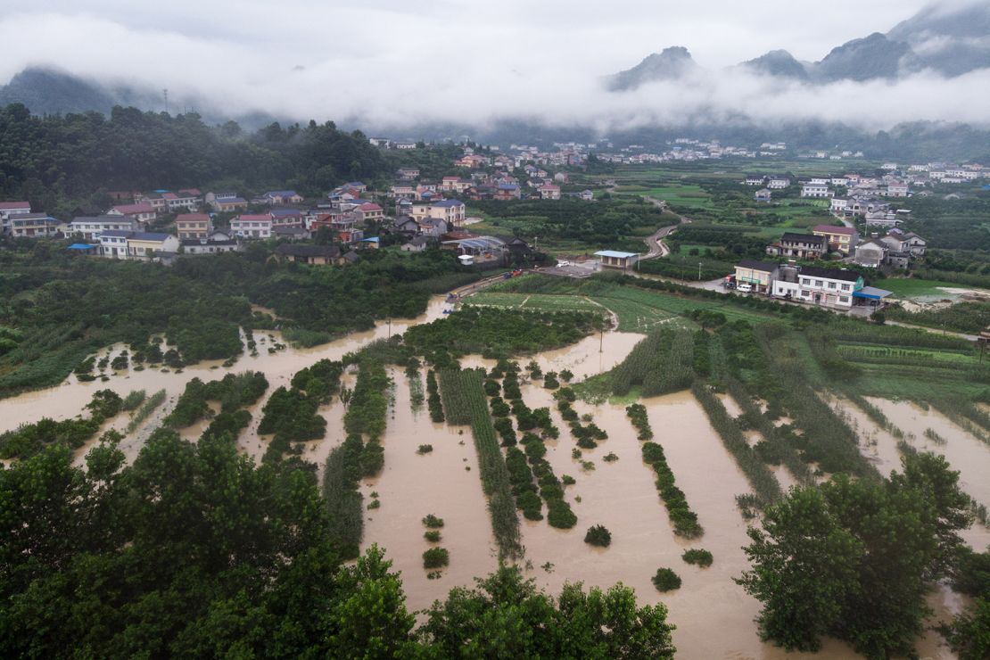 This aerial photo taken on July 6 shows flooded farmland in Shimen County, in central China's Hunan Province. The country has been hit by the worst flooding it has experienced in years.