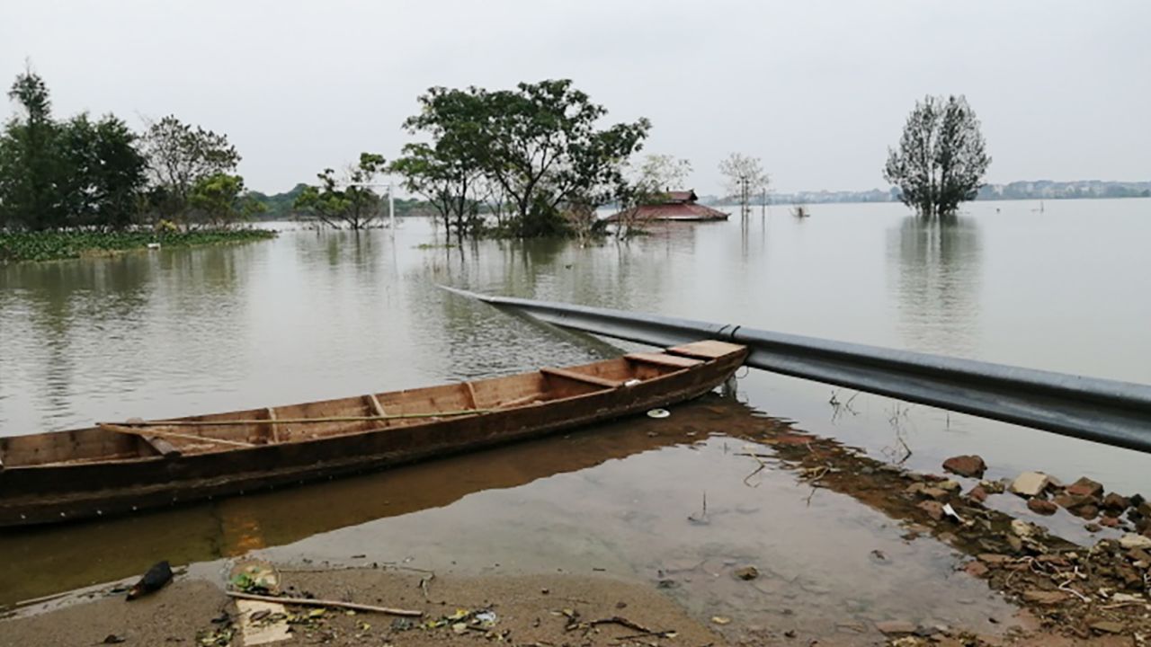 Bao Wentao's village near China's Poyang Lake has been flooded. The crops on his family farm have failed. Photo credit: Bao Wentao
