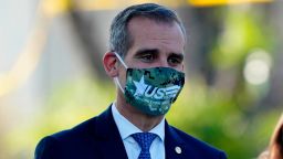 Los Angeles mayor Eric Garcetti wears a face mask at a press at a coronavirus COVID-19 testing site at Lincoln Park, Wednesday, Aug. 5, 2020, in Los Angeles. Kirby Lee via AP)