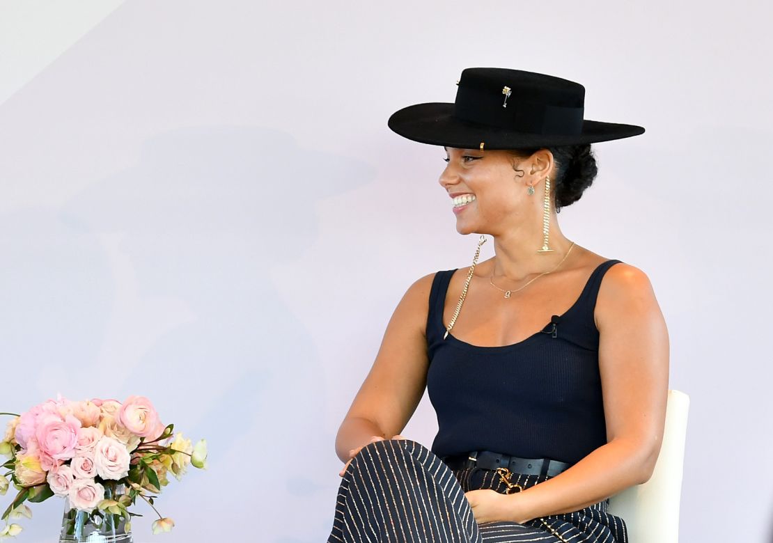 Alicia Keys speaks onstage at the Billboard x Amex Impact Brunch