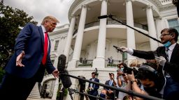 President Donald Trump speaks with members of the media before boarding Marine One on the South Lawn of the White House in Washington, Thursday, Aug. 6, 2020, for a short trip to Andrews Air Force Base, Md. and then on to Cleveland, Ohio. (AP Photo/Andrew Harnik)