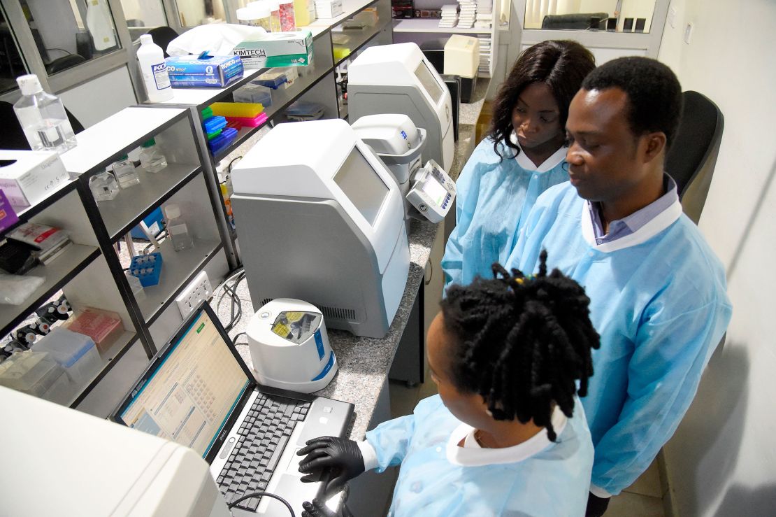 African Centre of Excellence for Genomics of Infectious Diseases (ACEGID) molecular biologists analyse COVID-19 samples in the laboratory located at the Redeemers University in Ede, southwestern Nigeria, on June 2, 2020. 