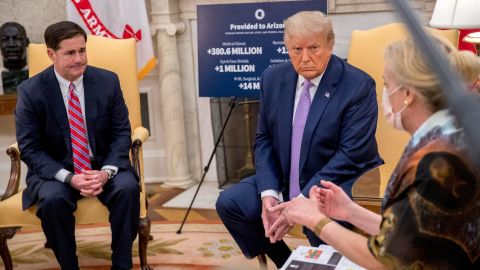 Dr. Deborah Birx, White House coronavirus response coordinator, right, speaks as President Donald Trump, center, meets with Arizona Gov. Doug Ducey, left, in the Oval Office of the White House in Washington, Wednesday, August 5, 2020.